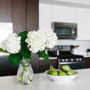Creating a Minimalist Kitchen. My kitchen is a blend of cozy minimalist, warm modern, Scandinavian and SoCal design. Here are 8 tips to help you clean, declutter and embrace a little minimalism.