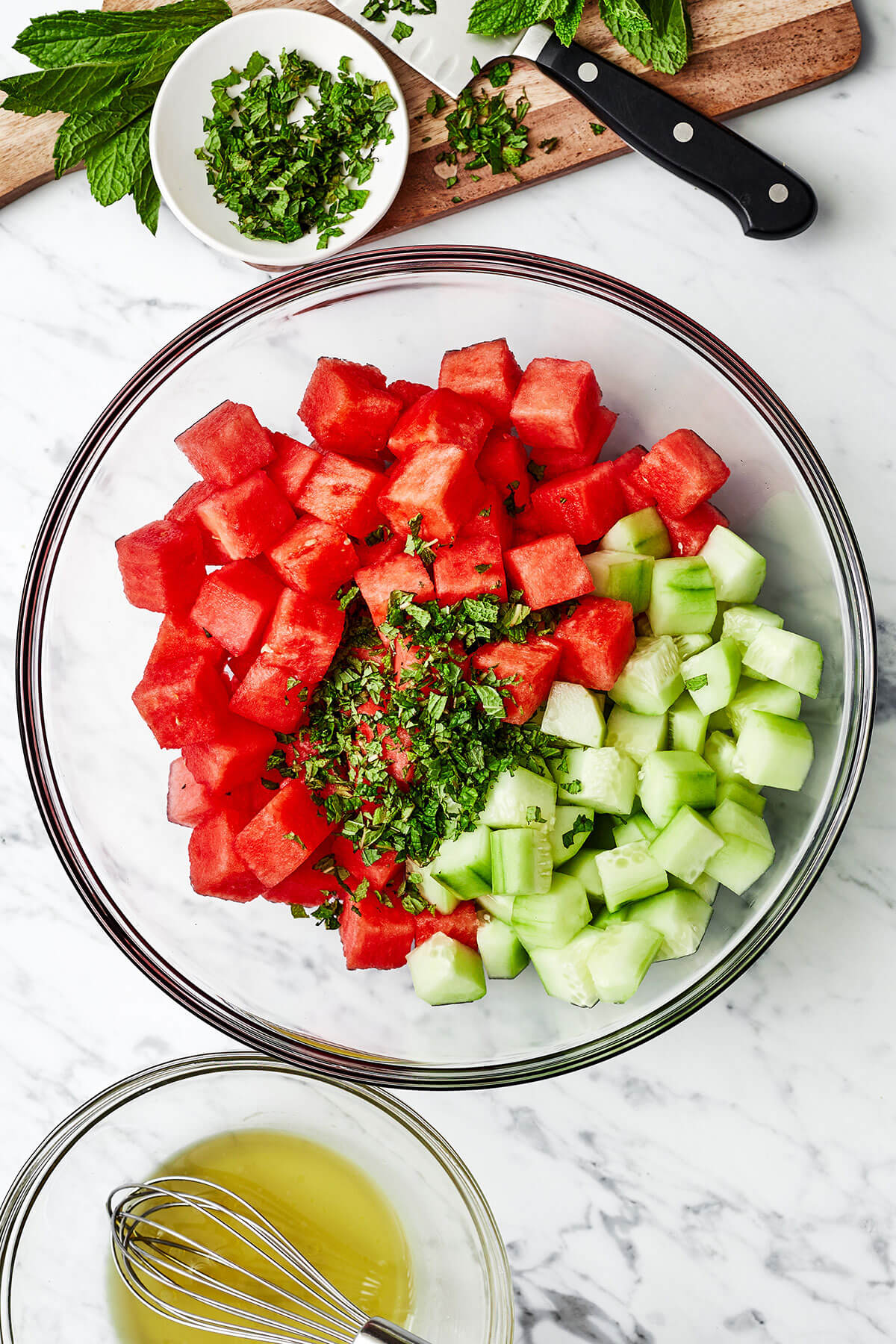 Watermelon salad ingredients in a bowl
